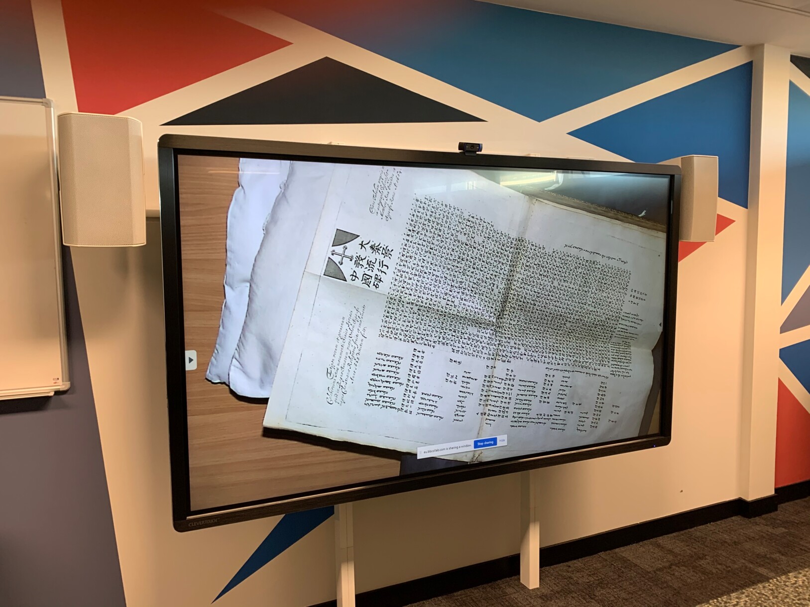 Rare books and other items displayed on-screen using a VZ-C6 Visualizer during online classes at The University of Edinburgh